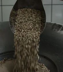 Grain pouring from a scoop