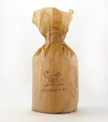 Monkey 47 bottle wrapped in brown paper