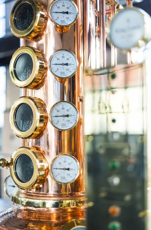 Copper column still with gauges and viewing windows
