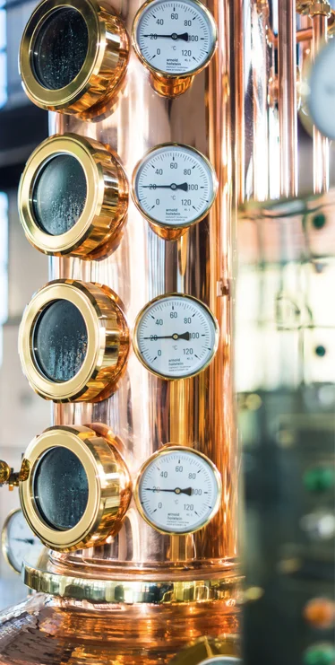 Copper still with gauges and sight glasses