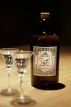 Monkey 47 bottle with two glasses