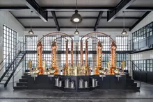 Copper stills of the Apparatus Alembicus Maximus in the distillery hall