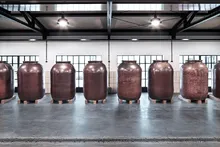 Row of earthenware maturation vessels