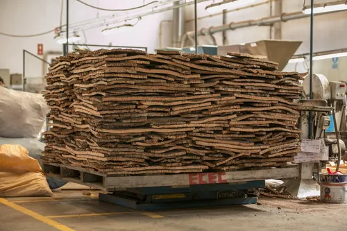 Stack of cork bark on a pallet in a factory