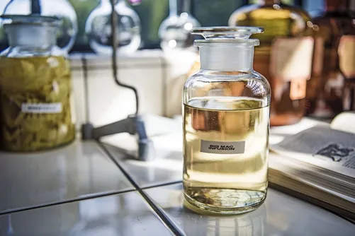 Glass jars of pickled onions and brine