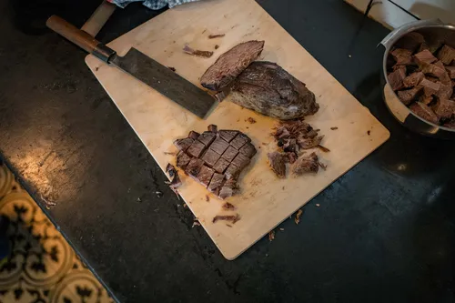Sliced boiled beef on a cutting board