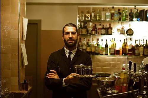 Bartender standing in the Hunky Dory bar