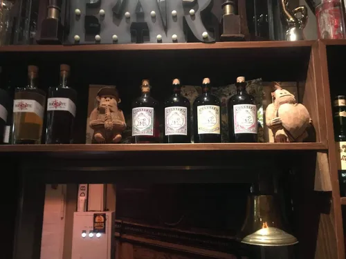 Back bar shelf with Monkey 47 bottles at Hunky Dory