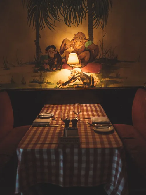 Candlelit table with a checked tablecloth at the Monkey Bar