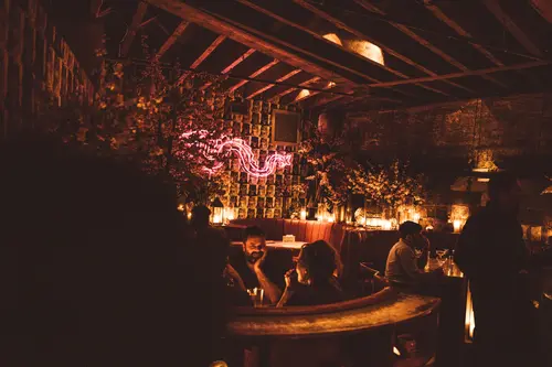 Warmly lit bar room at Peachy's