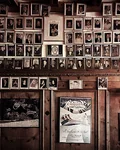 Wall covered in framed photos at The Zoo Bar