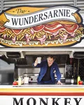 Chef serving from the Monkey 47 Wundersarnie food truck