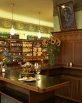 Interior of Zum Schwarzen Kameel in Vienna with shelves of wine