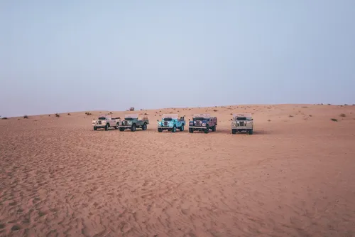 Convoy of 4x4 vehicles in the desert