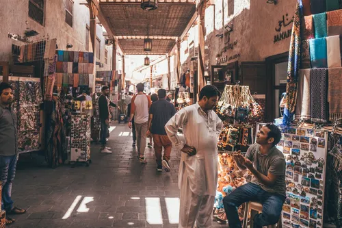 Busy covered market street in Dubai
