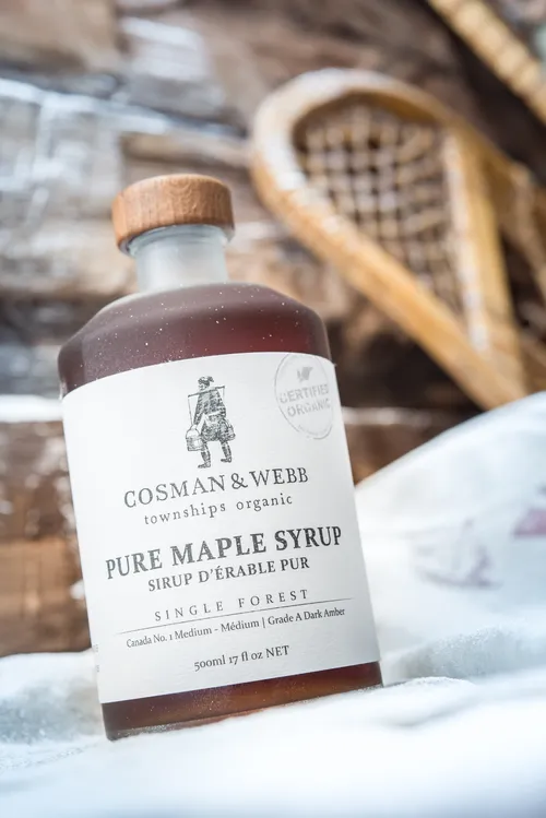 Cosman & Webb pure maple syrup bottle in the snow