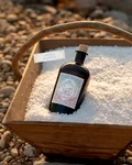 Monkey 47 Distiller's Cut 2025 bottle in a crate of salt