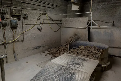 Clay being processed on a conveyor in the factory