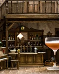 Charlie Chaplin cocktail with a lime wedge