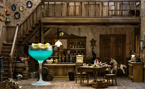 Corpse Reviver No. Blue with a lemon garnish