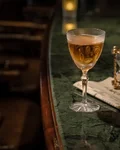 Martinez cocktail with an hourglass