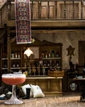 Max & Monty cocktail in a miniature saloon setting