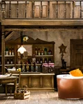 Sloe Gin Fizz in a miniature saloon setting