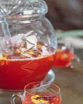 The "Nearby" Punch in a glass teapot with cups