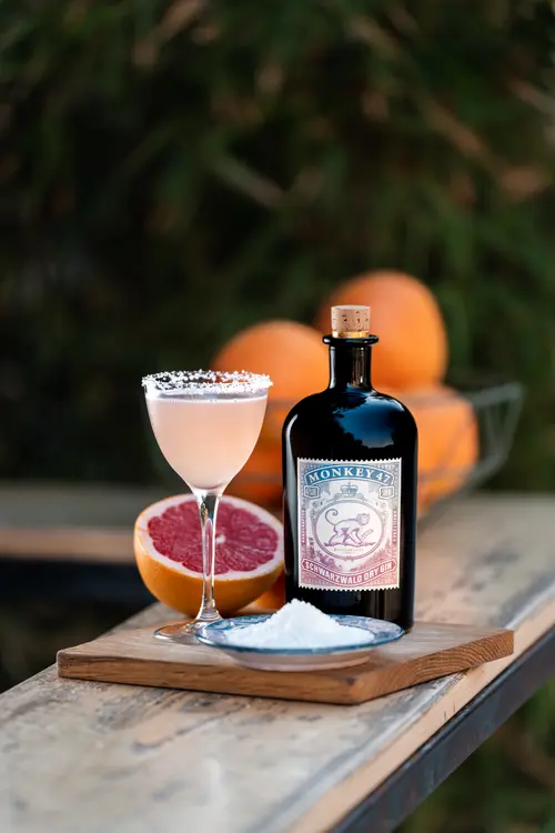 The Salty Monkey with a salted rim next to Monkey 47 Distiller's Cut