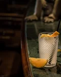 Tom Collins with an orange slice