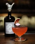 Twentieth Century cocktail next to a Monkey 47 bottle