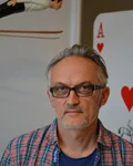 Axel Haberstroh portrait in glasses and checked shirt