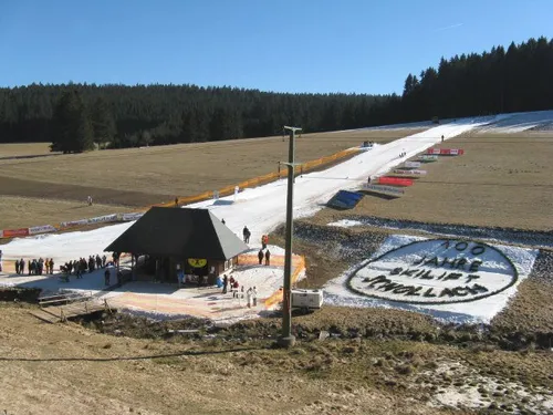 Ski lift on a Black Forest slope with little snow