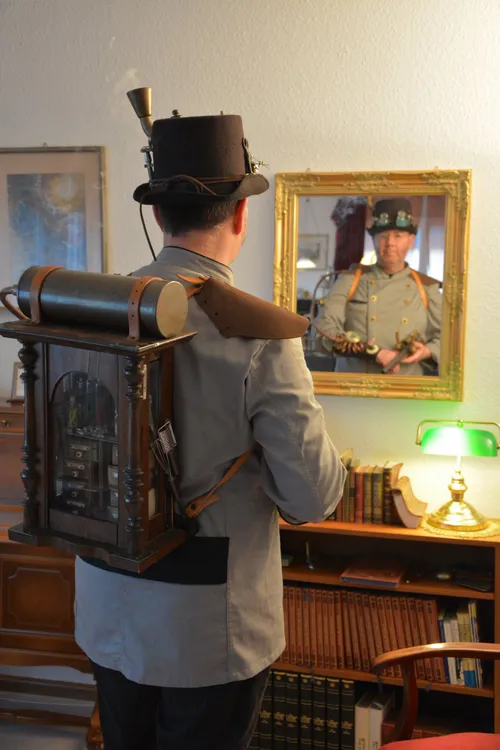 Man wearing a steampunk backpack contraption