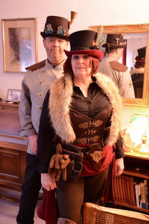 Couple in steampunk costumes
