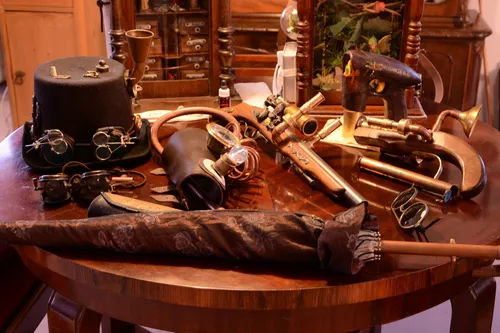 Steampunk gadgets and brass instruments on a table