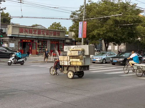 Street scene in Beijing with a delivery tricycle