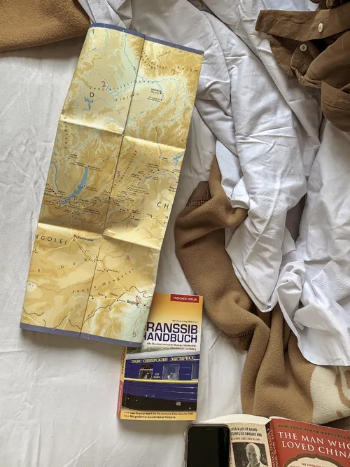 Map and travel guide on a train bunk