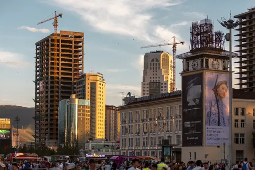 Ulaanbaatar skyline with cranes and high-rise buildings