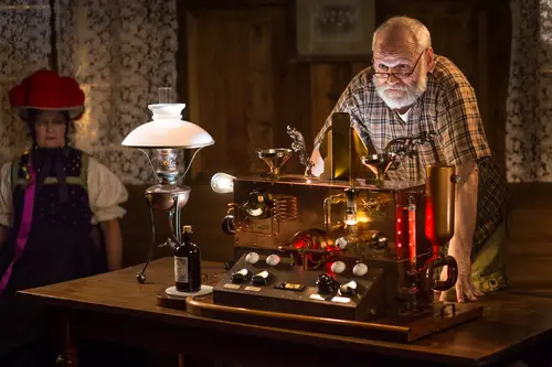 Erhard von Umtrieb with a steampunk contraption and oil lamp